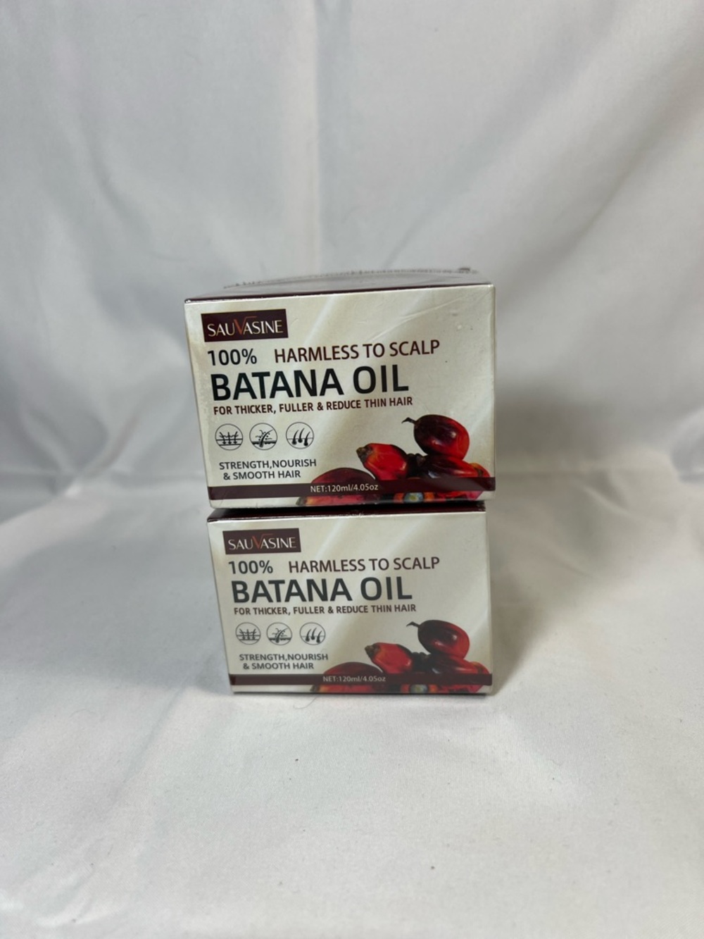 Batana Oil Hair Treatment - Nourishing Scalp Oil in Cream and Red Packaging
